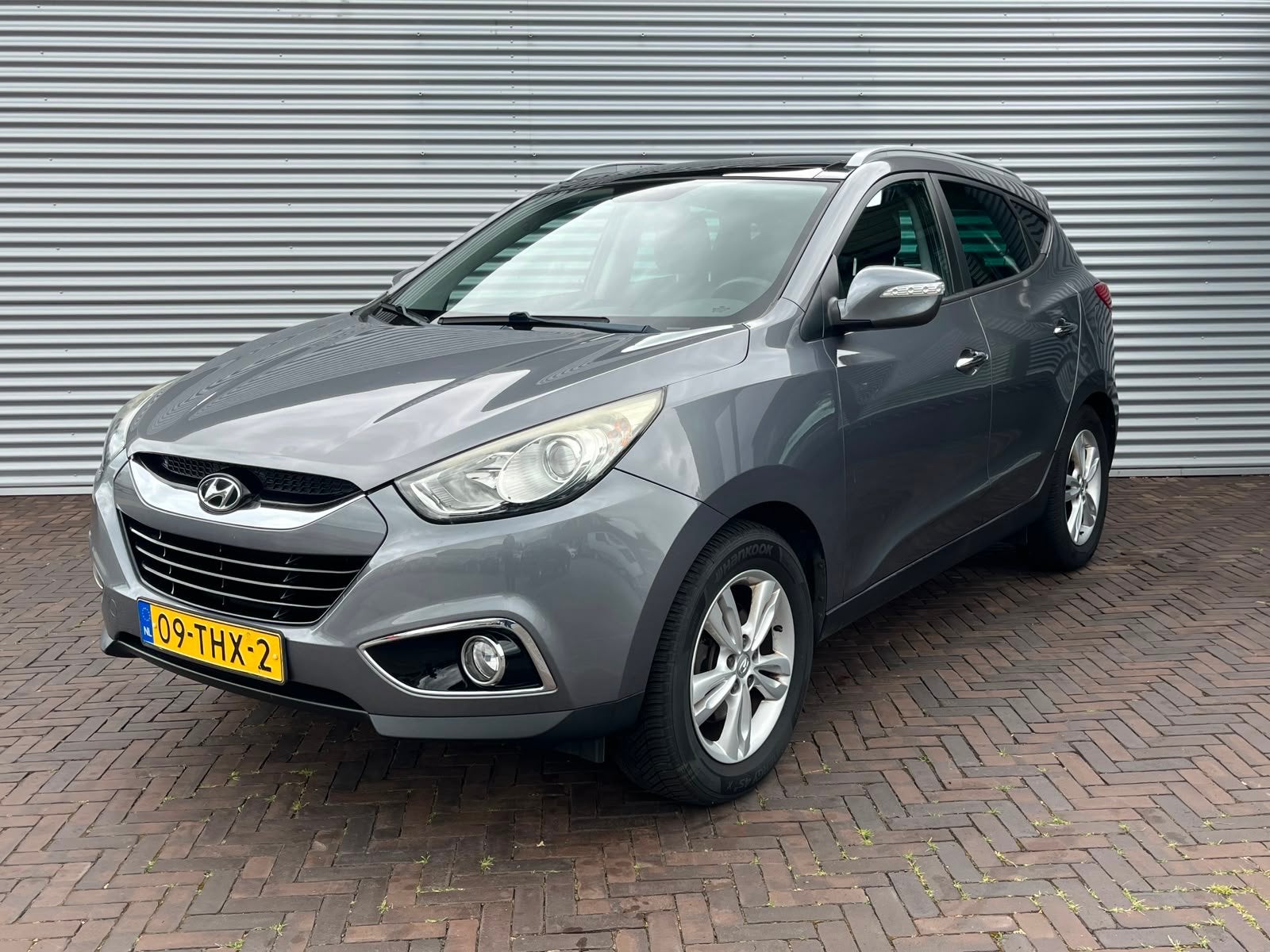 Hyundai ix35 2.0i Style (bj 2012, automaat), Auto's, Hyundai, Gebruikt, Zwart, 4 cilinders, Automatische klimaatregeling