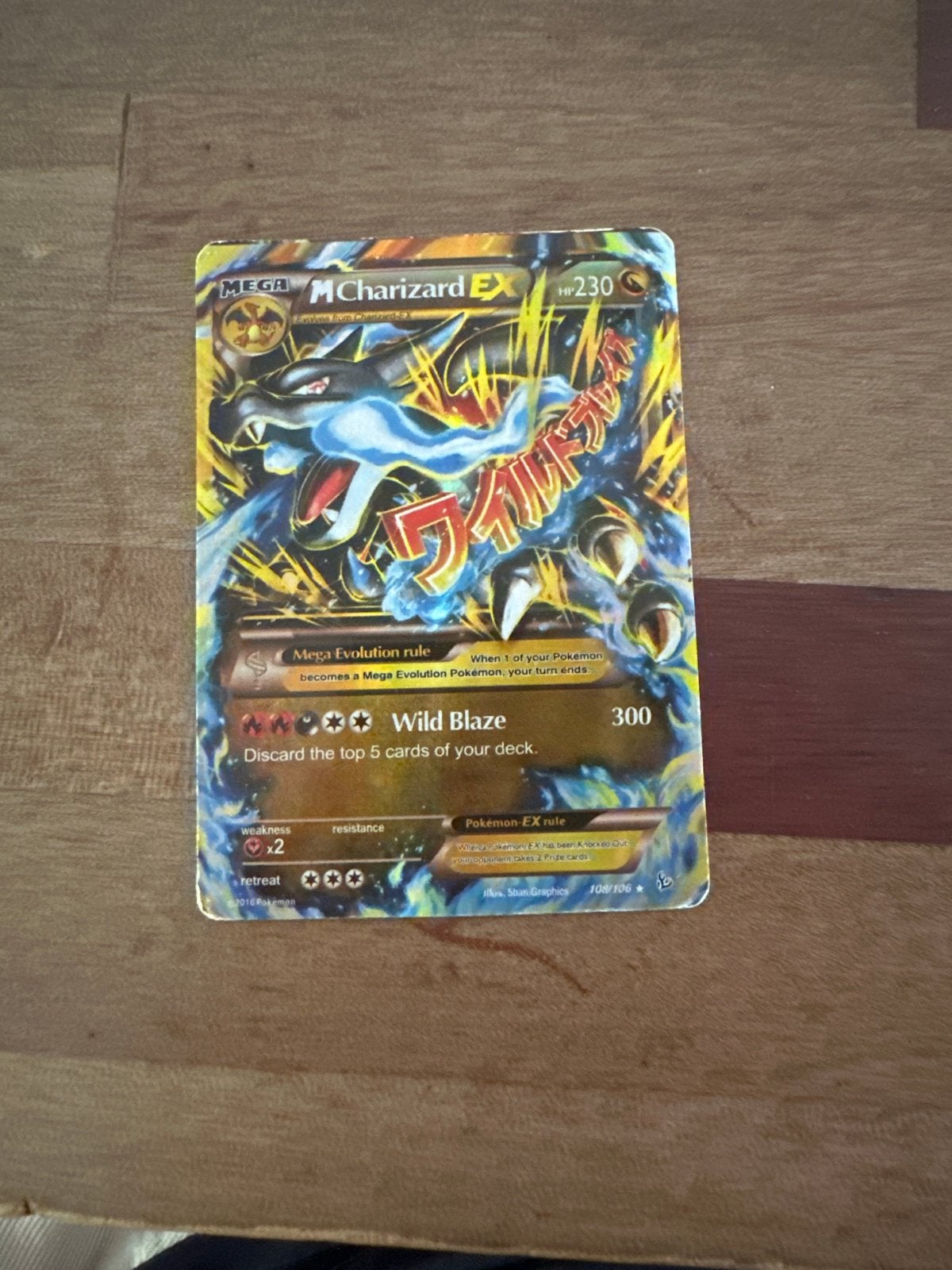 Pokémon M Charizard EX Kaart - Zeldzaam en Krachtig, Ophalen of Verzenden, Gebruikt, Losse kaart, Foil