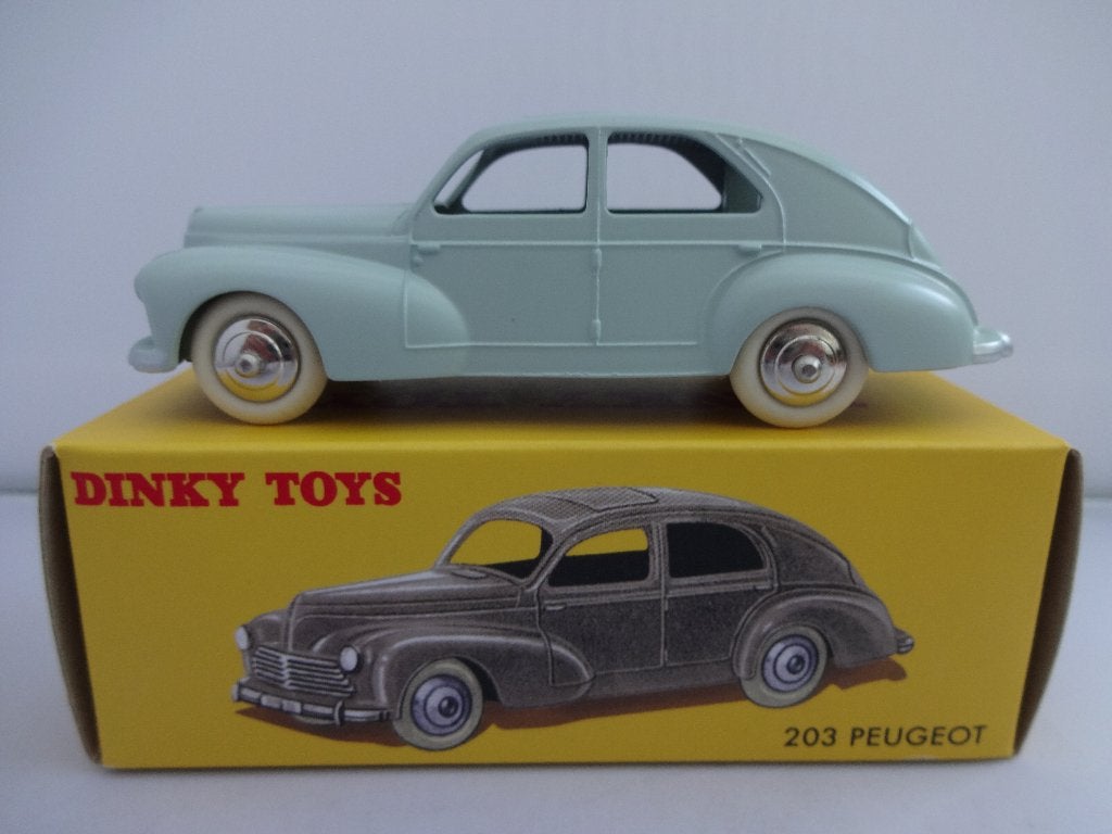 Peugeot 203 licht blauw nr: 24R-533 van Dinky Toys 1:43, Hobby en Vrije tijd, Modelauto's | 1:43, Ophalen of Verzenden, Nieuw