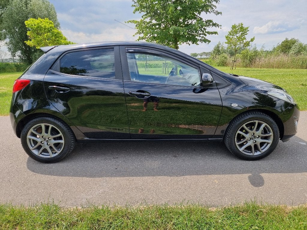 Mazda 2 1.3 Bifuel Navigator GT, Auto's, Voorwielaandrijving, Euro 5, 37 €/maand, Zwart