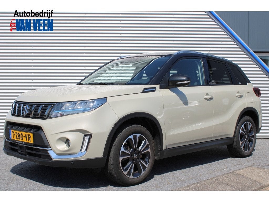 Suzuki Vitara 1.4 Boosterjet Style Smart Hybrid | Half Leder, Stof, Gebruikt, 4 cilinders, 49 €/maand