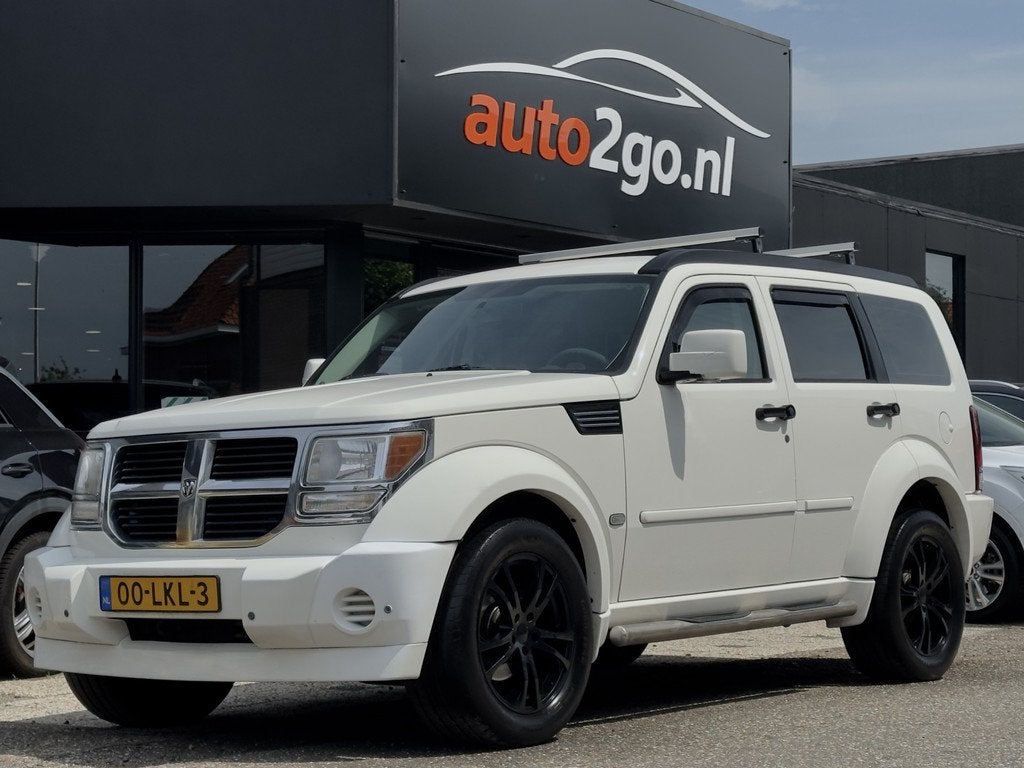 Dodge Nitro 3.7 V6 AUT4 SE NAVI AIRCO LED LMV PDC (bj 2008), Auto's, Dodge, Automaat, Gebruikt, 2500 kg, Wit