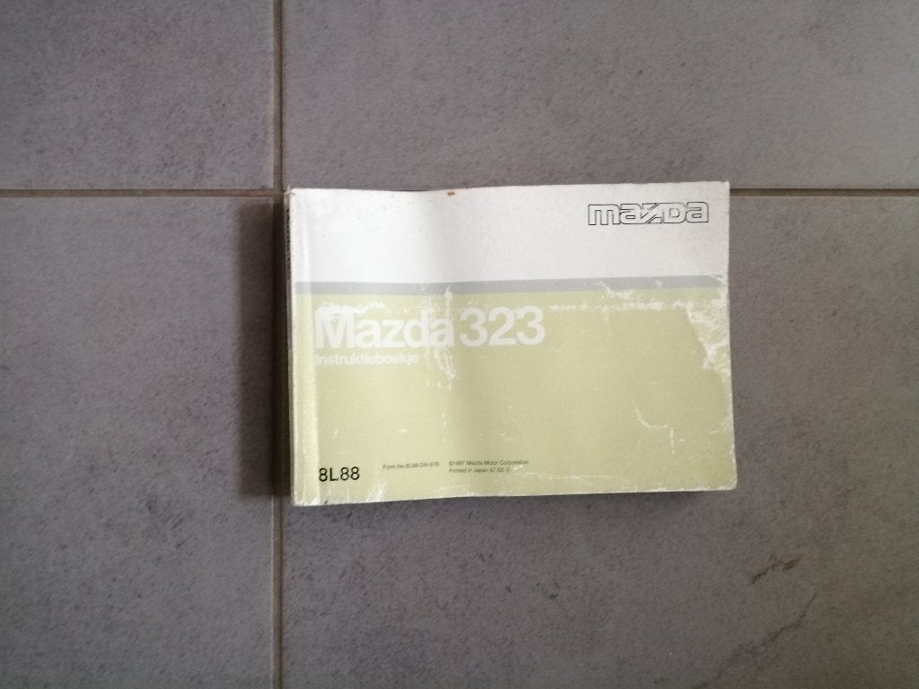 Gebruikershandleiding MAZDA 323 COUPE  (3-drs)   1994/1999, Ophalen of Verzenden
