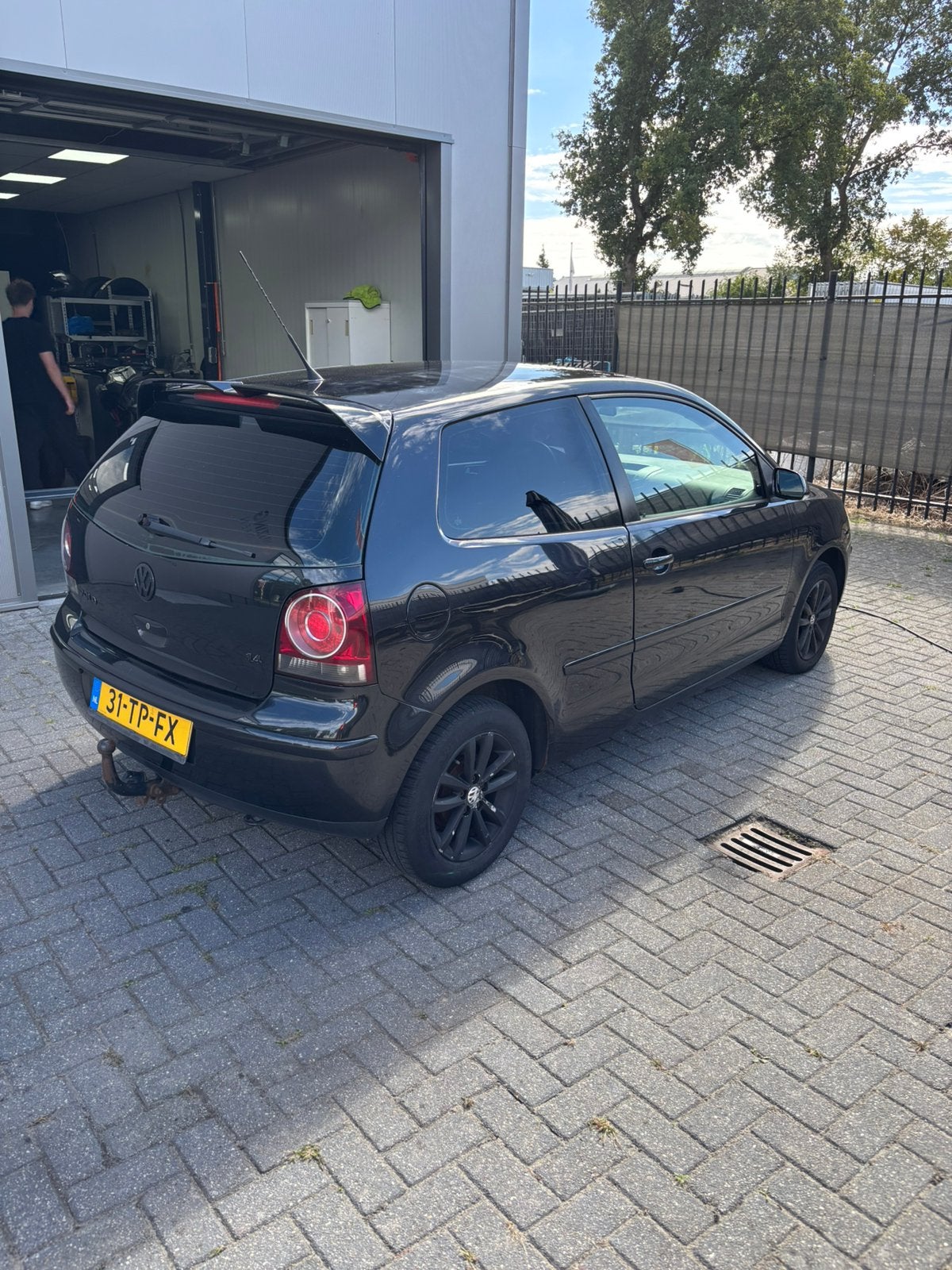 Volkswagen Polo 1.4 16V 59KW 2006 Zwart, Auto's, Voorwielaandrijving, 4 cilinders, Zwart, Handgeschakeld