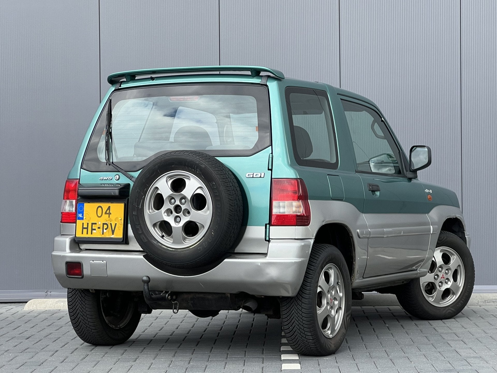 Mitsubishi Pajero Pinin 1.8 GDI Venice | Trekhaak | Airco, Auto's, Oldtimers, Stof, Zwart, 1834 cc, Bedrijf