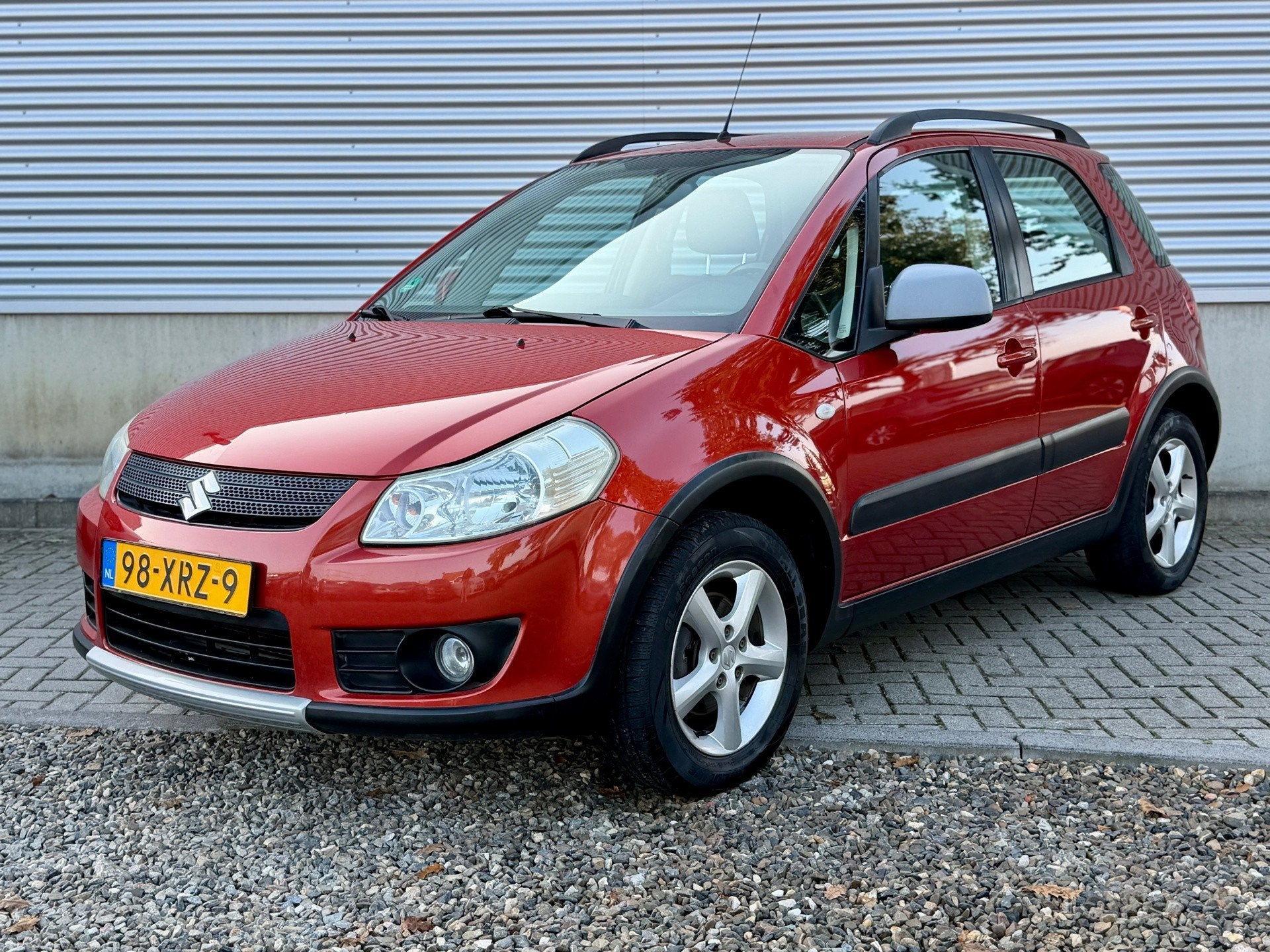 Suzuki SX4 1.6 4X4 Exclusive [ eccaudio,lmv ], Dealer onderhouden, Stof, Gebruikt, Zwart