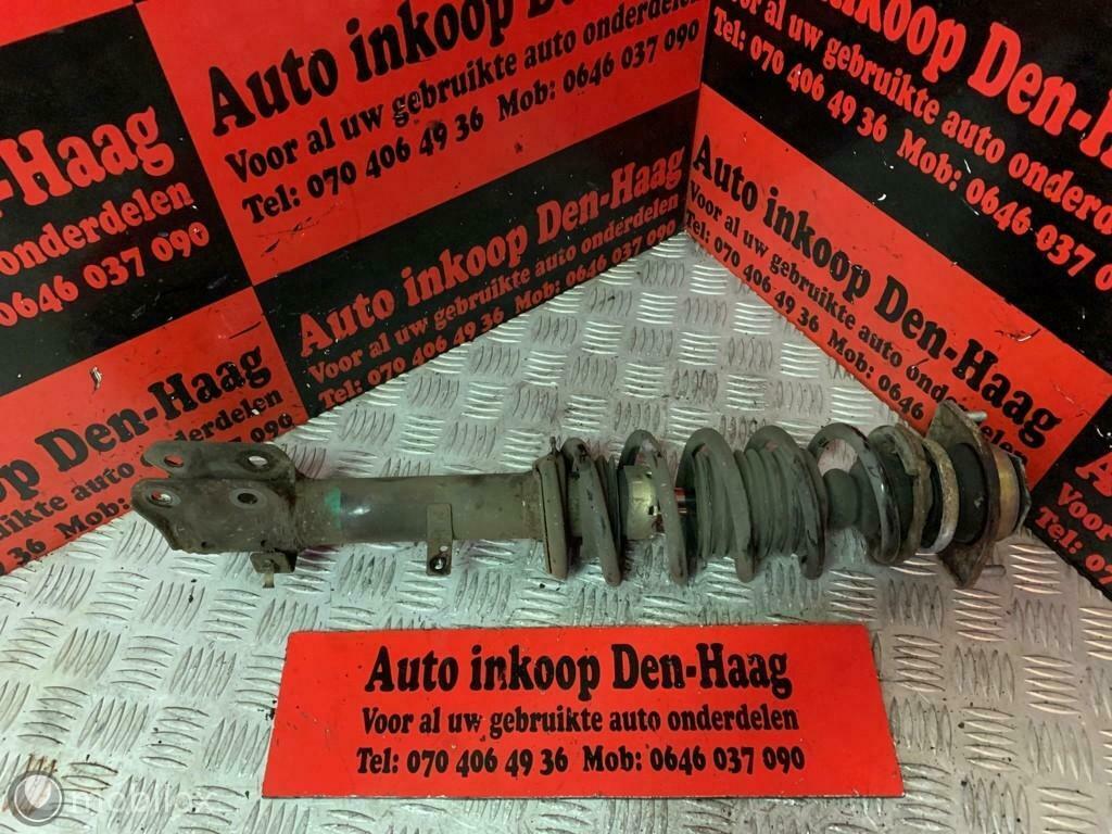 Daihatsu Cuore ('03-'07) Veerpoot Schokbreker Linksvoor, Ophalen of Verzenden, Gebruikt, Daihatsu