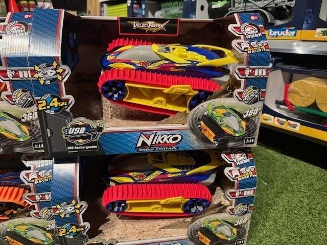 Nikko RC auto Velocitrax Oranje 360 rotatie actie nu €35, Kinderen en Baby's, Speelgoed | Speelgoedvoertuigen, Ophalen of Verzenden