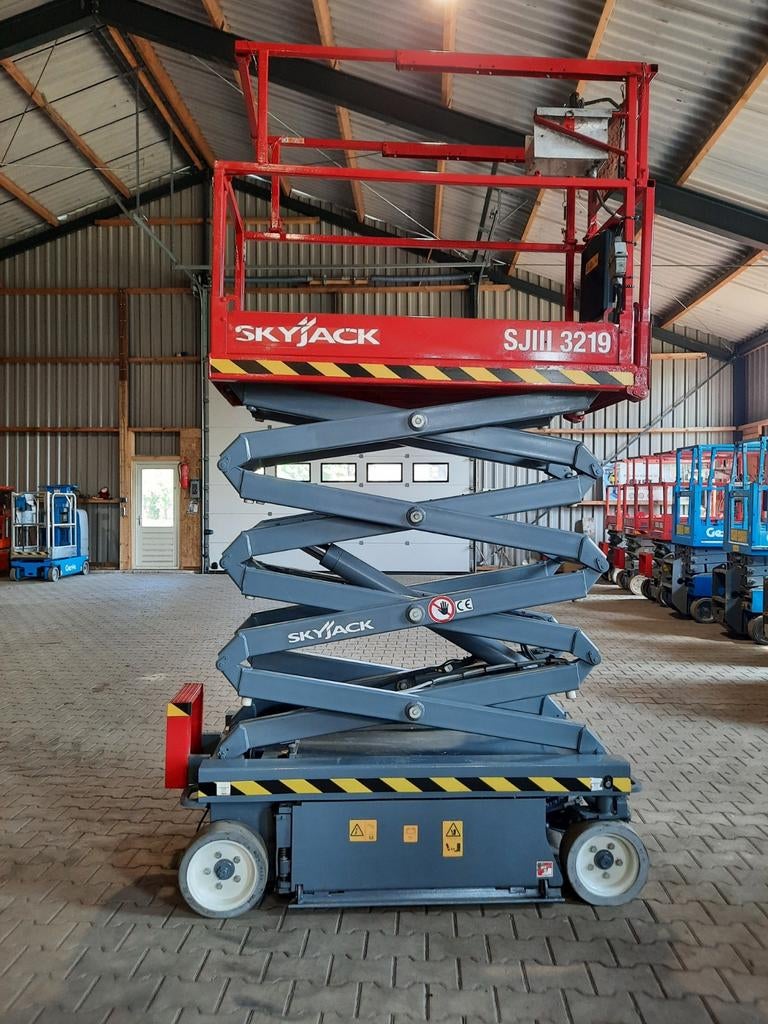 Skyjack schaarhoogwerker hoogwerker 3219  3220  3215 JLG2032, Zakelijke goederen, Machines en Bouw | Liften, Steigers en Ladders