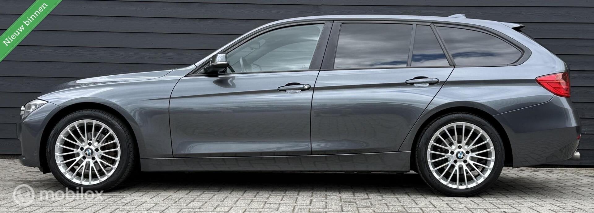 BMW 3-serie Touring 318d High Executive Leder/Navi/Cruise, Auto's, 4 cilinders, Met garantie (alle), Leder, Te koop
