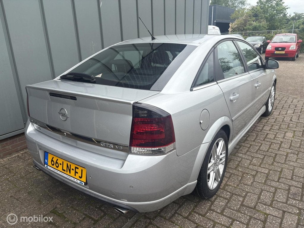 Opel Vectra GTS 3.2 V6 Elegance, Gebruikt, Leder en Stof, Vectra, Origineel Nederlands