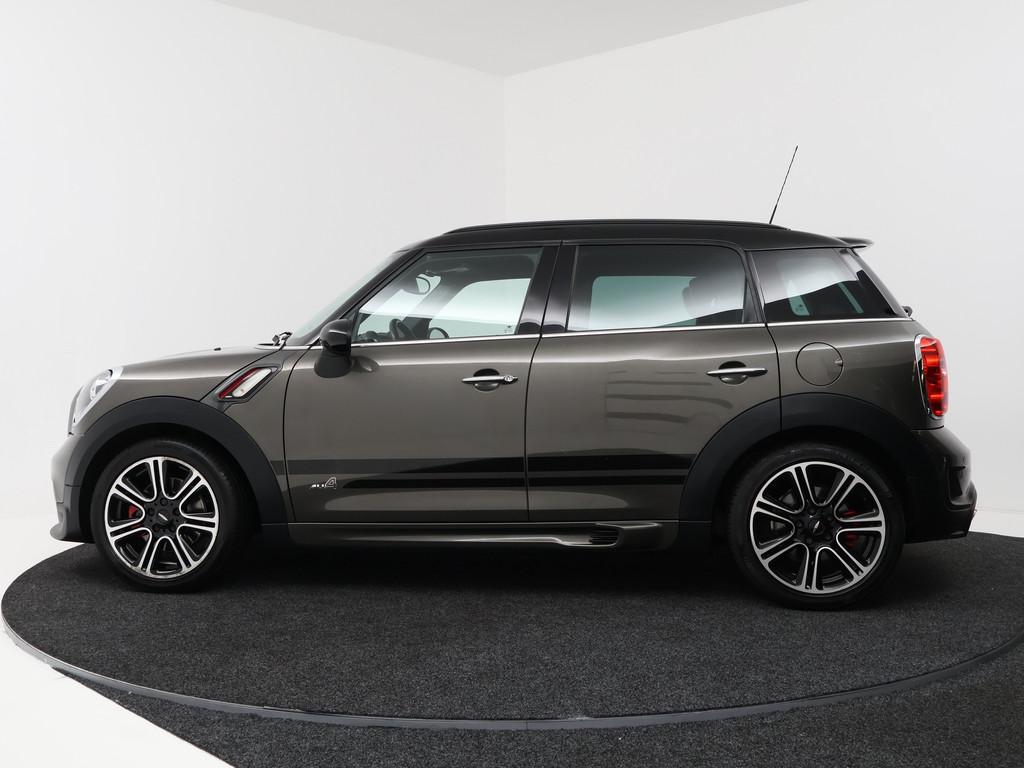 MINI Countryman 1.6 John Cooper Works ALL4 Chili | Verwarmde, 1380 kg, Gebruikt, Zwart, Handgeschakeld