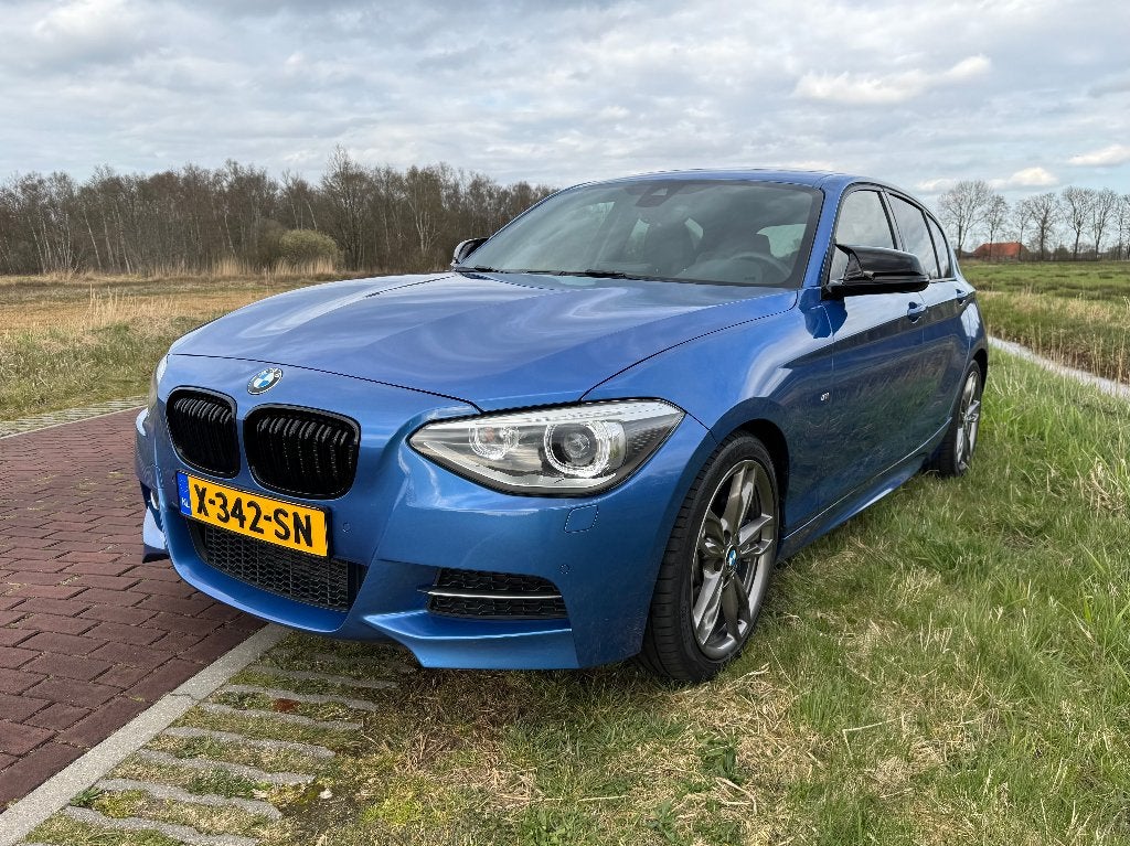 BMW M135i xDrive N55 Estoril Pano Leder H/K Keyless, Leder, Vierwielaandrijving, Particulier, Lichtsensor