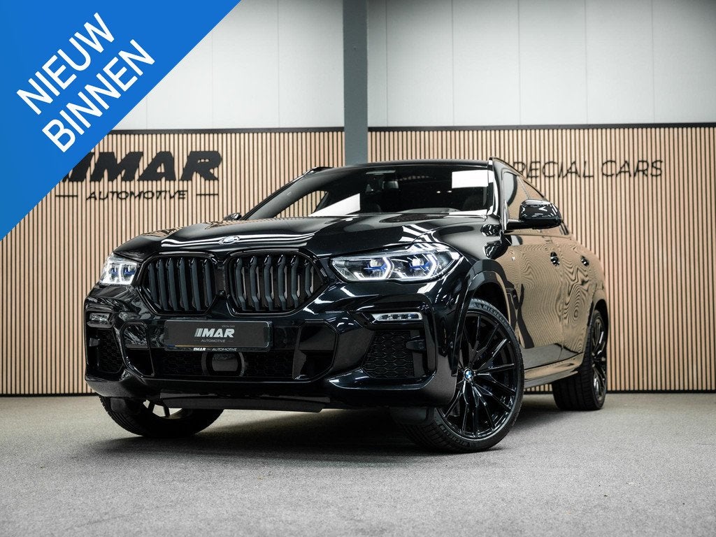 BMW X6 M50i High Executive, Auto's, Automaat, Stof, Gebruikt, 2210 kg