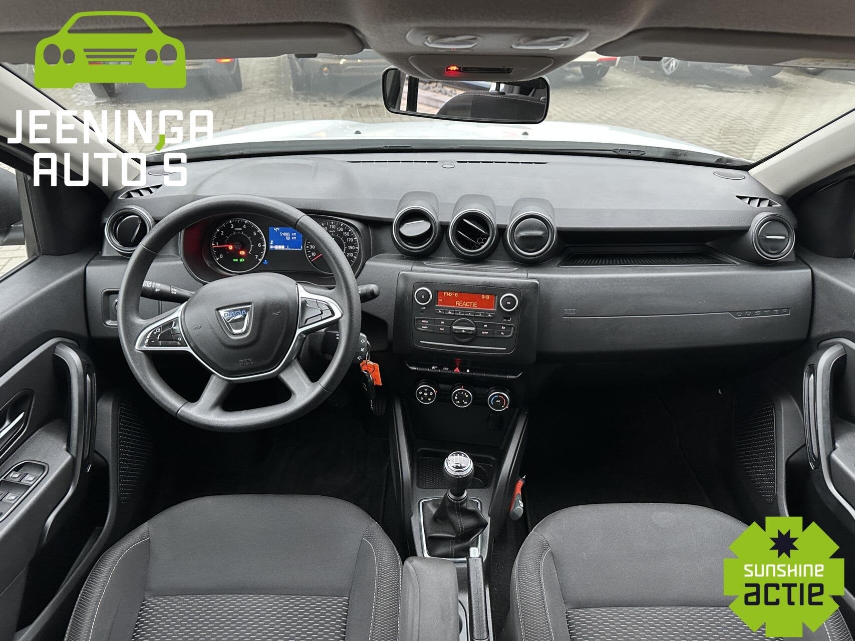 Dacia Duster TCe 100 Comfort|Airco|Cruise, Auto's, Gebruikt, 4 cilinders, Duster, Wit