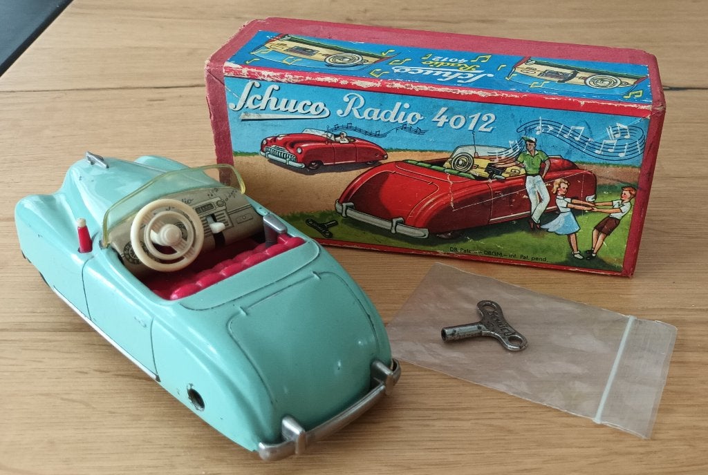 Schuco 4012 Cabrio met doos en sleutel, Antiek en Kunst, Antiek | Speelgoed, Ophalen of Verzenden