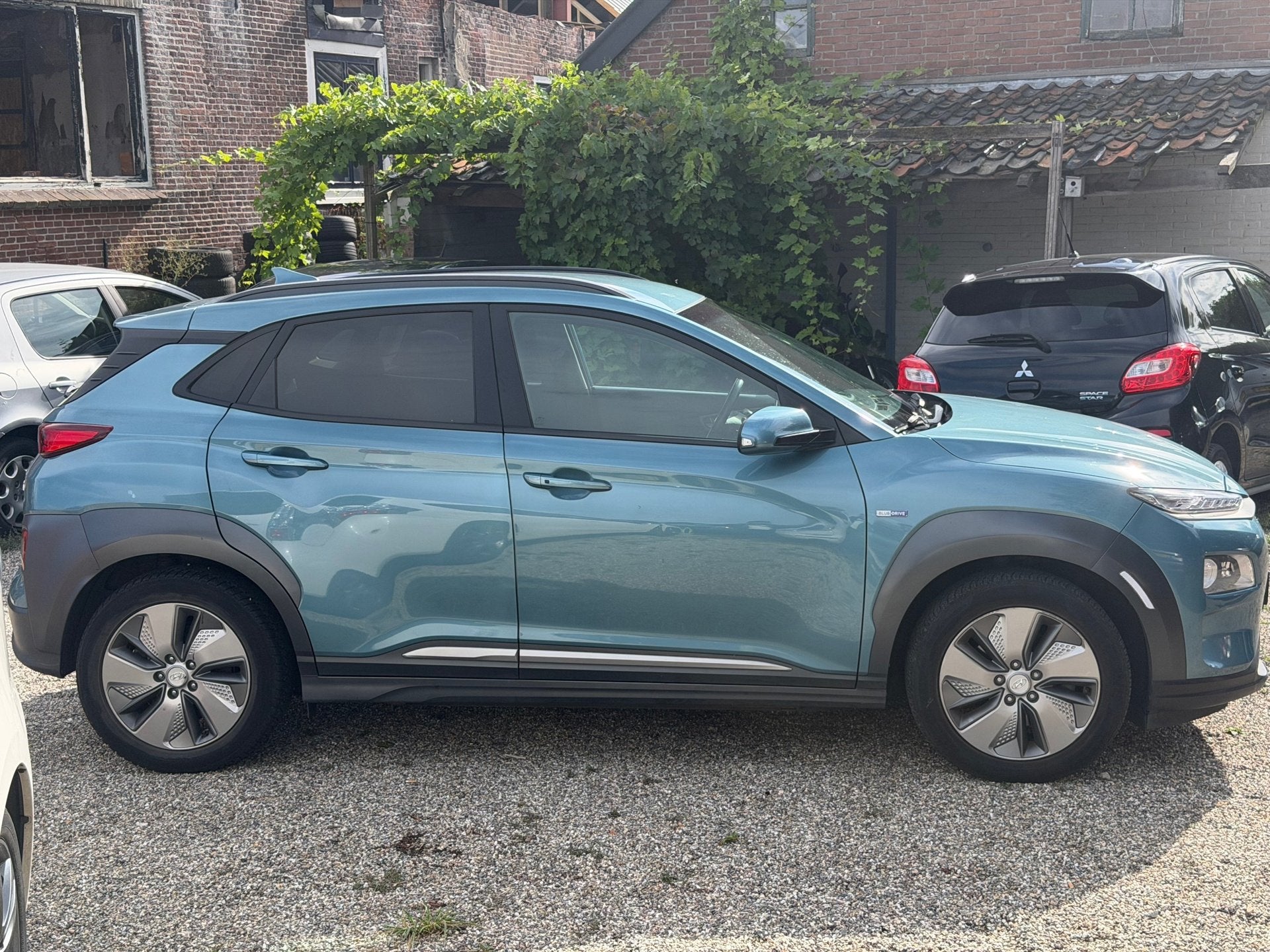 Hyundai Kona EV Premium 64 kWh 450+ Bereik 3 Fase Bomvol Opt, Auto's, Dealer onderhouden, Gebruikt, Zwart, 174 min