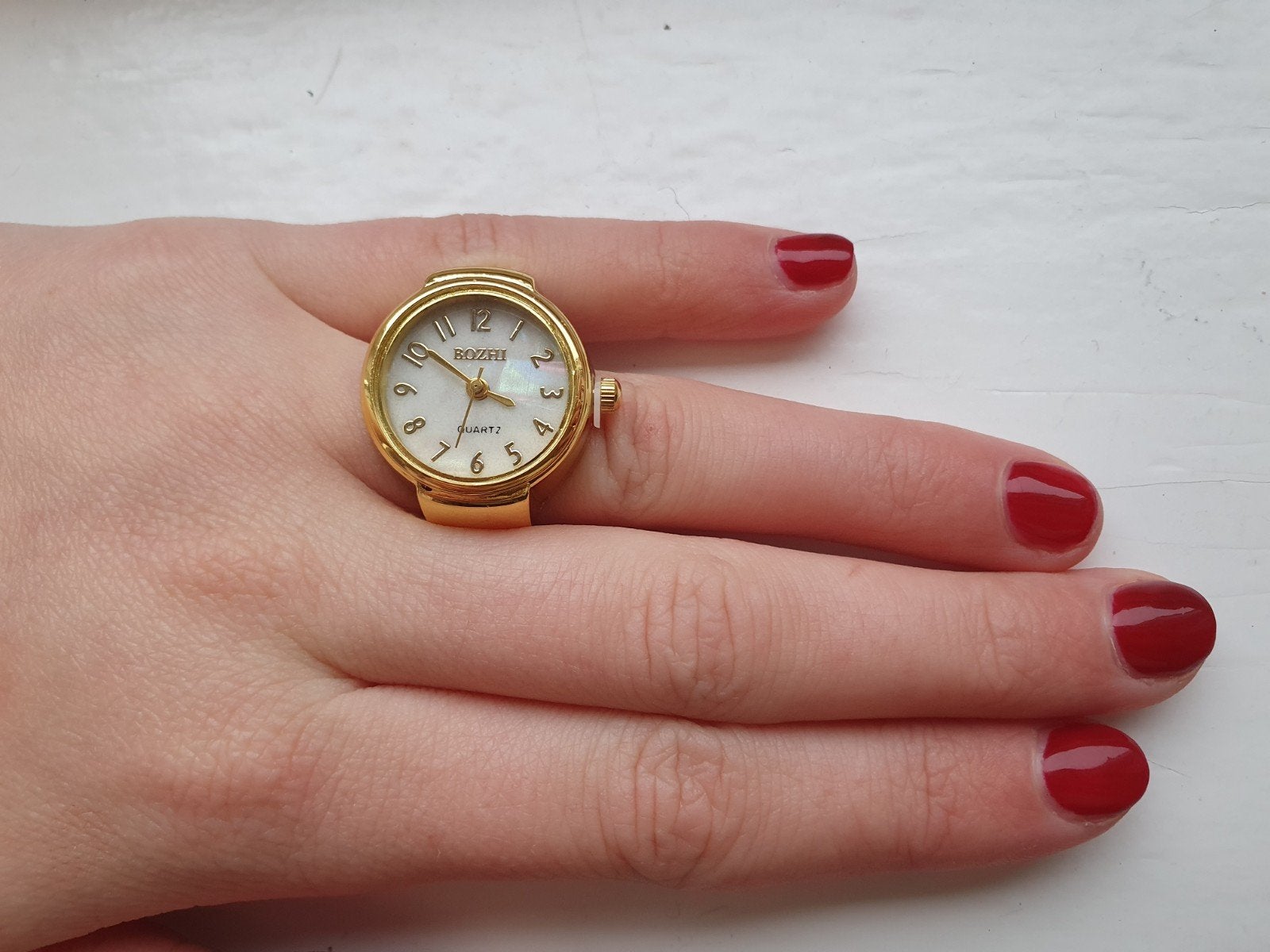 Nieuwe goudkleurige ring horloge, universele maat., IJzer of Staal, Nieuw, Ophalen of Verzenden, Dame