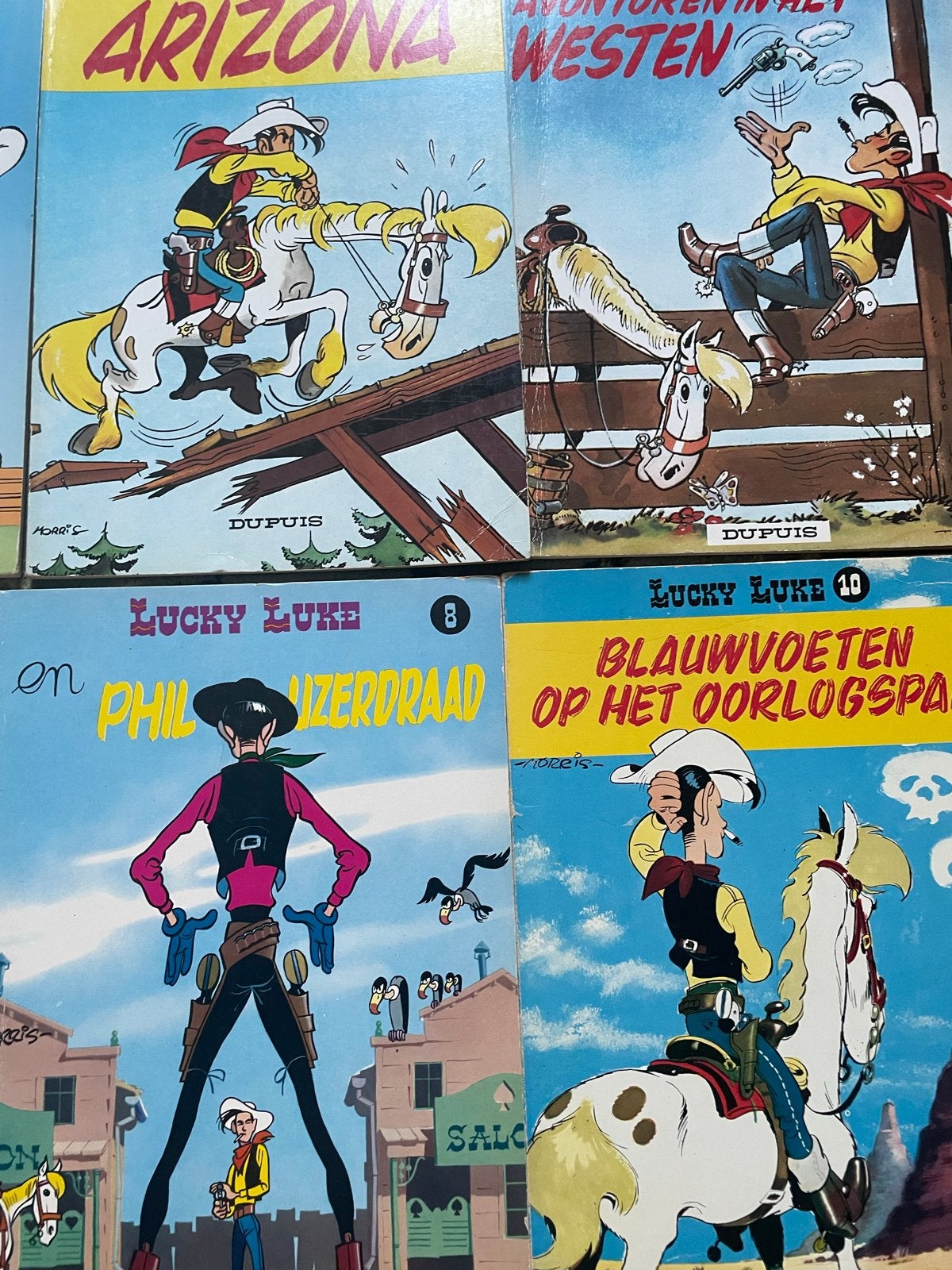Lucky Luke stripboeken - Diverse titels, Meerdere stripboeken, Ophalen of Verzenden, Gelezen