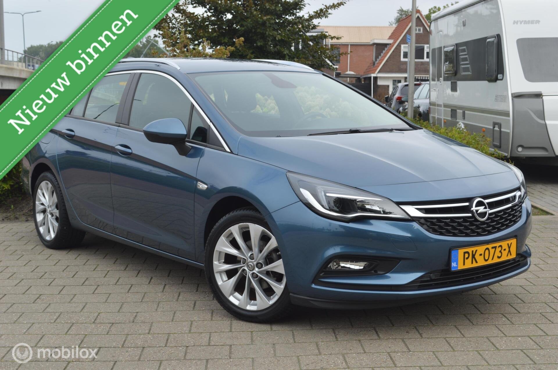 Opel Astra Sports Tourer 1.0 Business+, Auto's, Voorwielaandrijving, Stof, Gebruikt, 1178 kg