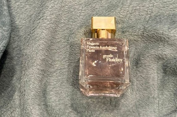 Gentle Fluidity Gold Eau de Parfum 70ml, Ophalen of Verzenden, Zo goed als nieuw