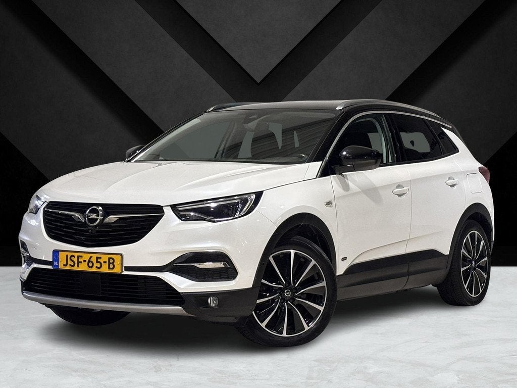 Opel Grandland X Ultimate+ 1.6 HYbrid4 PHEV 300pk 4x4 e-EAT8, Auto's, Opel, Automaat, Gebruikt, 4 cilinders, Bedrijf