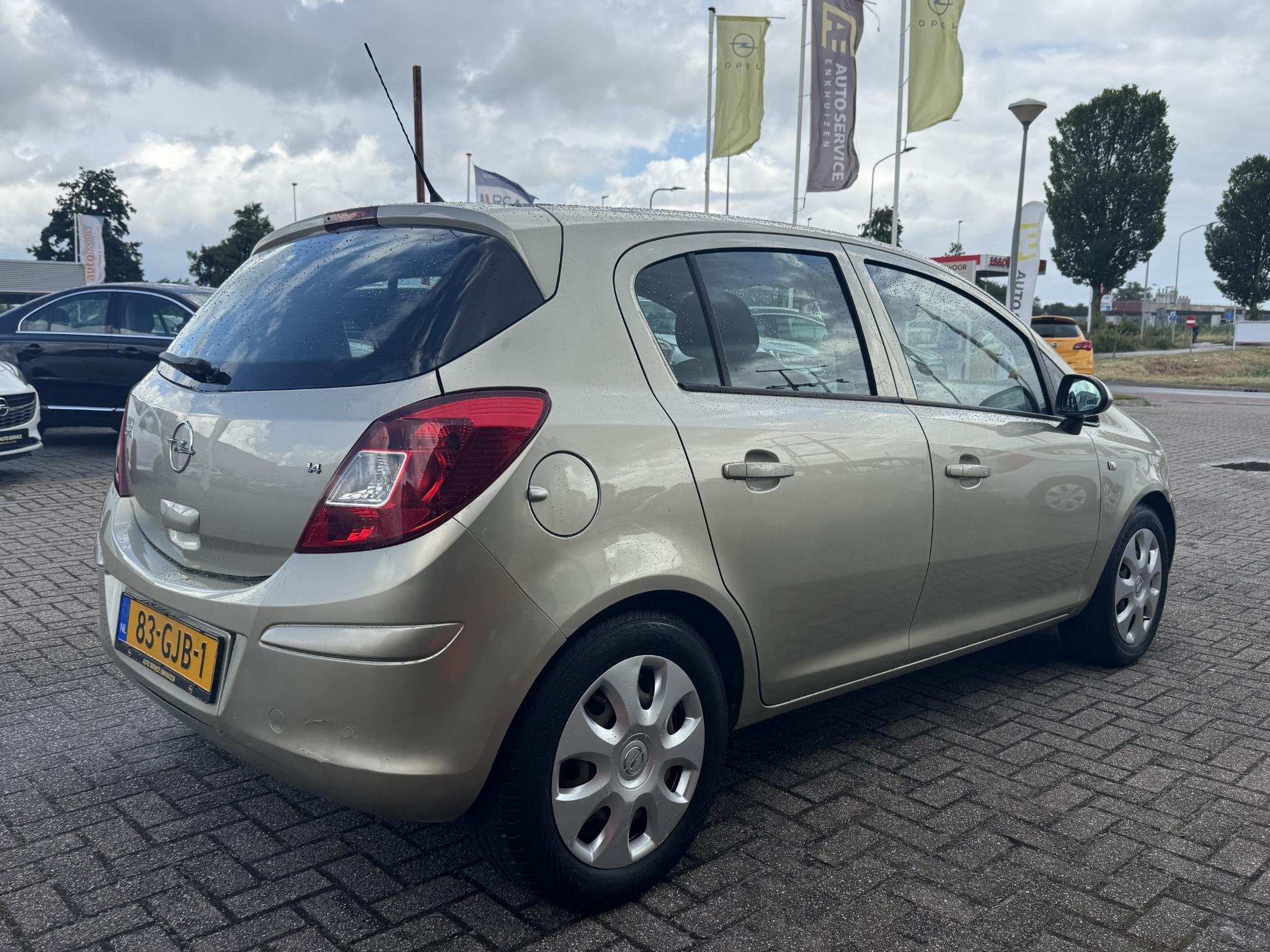Opel Corsa 1.4-16V Enjoy, Auto's, Voorwielaandrijving, Gebruikt, 4 cilinders, Origineel Nederlands