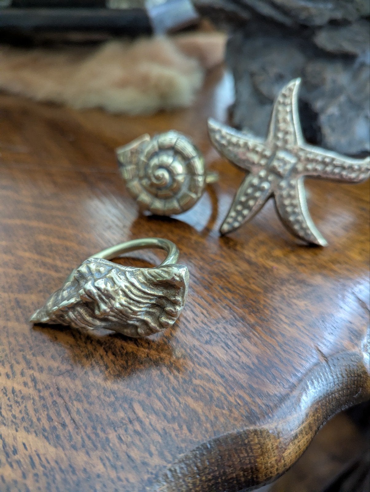 Set van 3 unieke servet  ringen: zeester, schelp en nautilus, Ophalen of Verzenden, Zo goed als nieuw