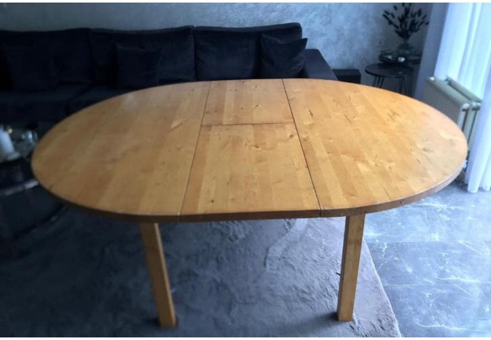 Ovale uitschuifbare eettafel van licht hout, Huis en Inrichting, Gebruikt, 100 tot 150 cm, Ophalen of Verzenden, 150 tot 200 cm