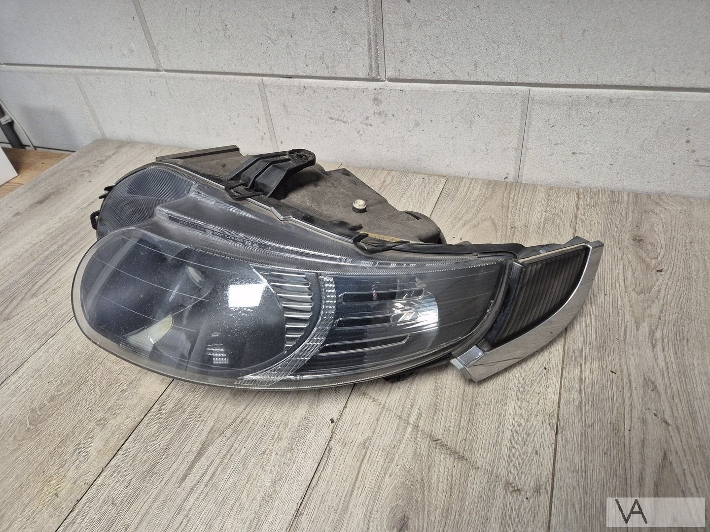 Koplamp XENON links voor Saab 9-5 facelift vanaf 2005 €250, Gebruikt, -, -, Ophalen of Verzenden