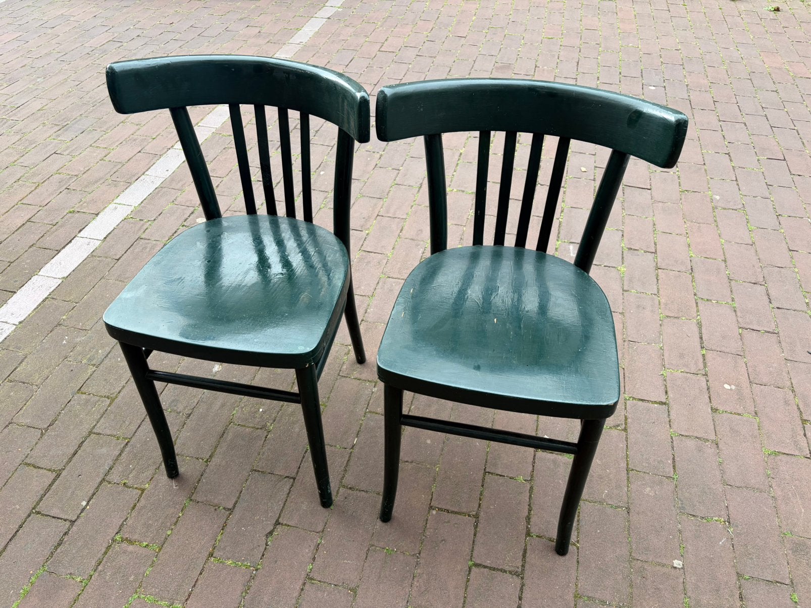 Twee groene cafe stoelen, Ophalen