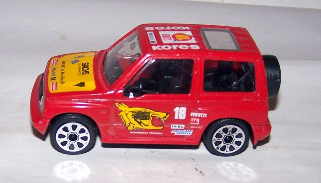 Bburago mooi model Suzuku Vitara Rally. 1/43. Nwst., Ophalen of Verzenden, Zo goed als nieuw, Auto, Overige merken