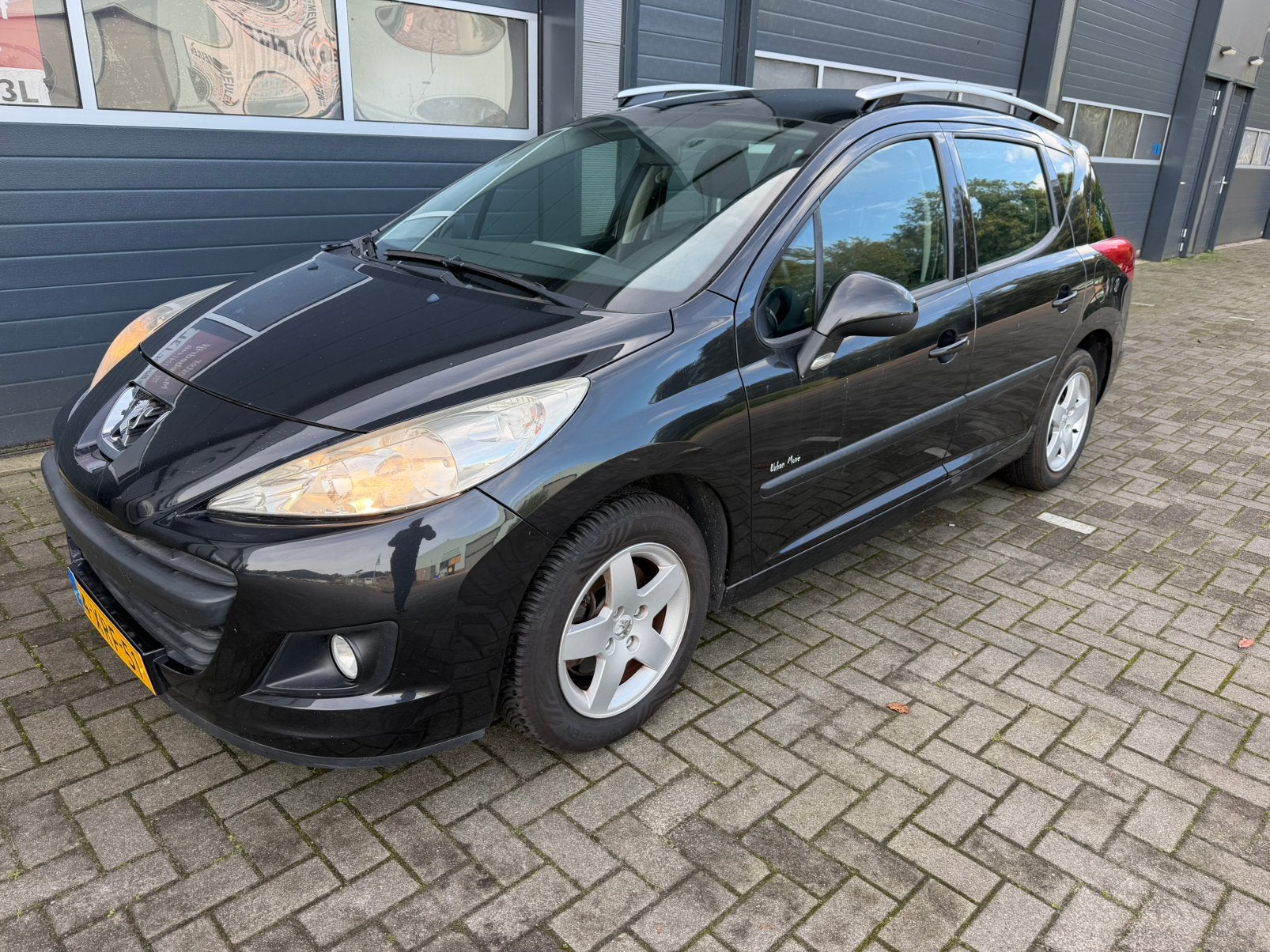 Peugeot 207 1.4 SW Accent 95pk 2010 AIRCO, Voorwielaandrijving, Stof, Zwart, Handgeschakeld