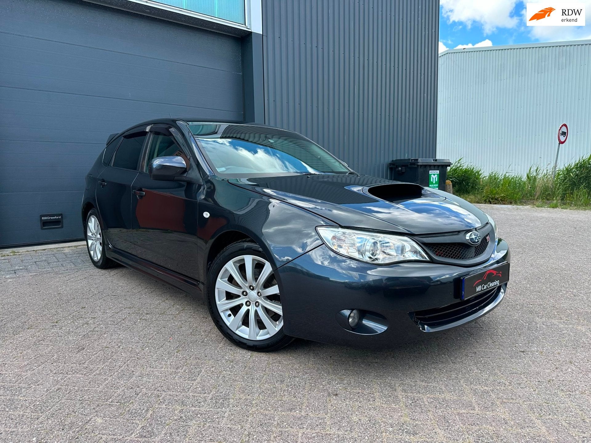 Subaru Impreza 2.5 WRX Executive AWD, 230 pk, Stof, Gebruikt, Zwart