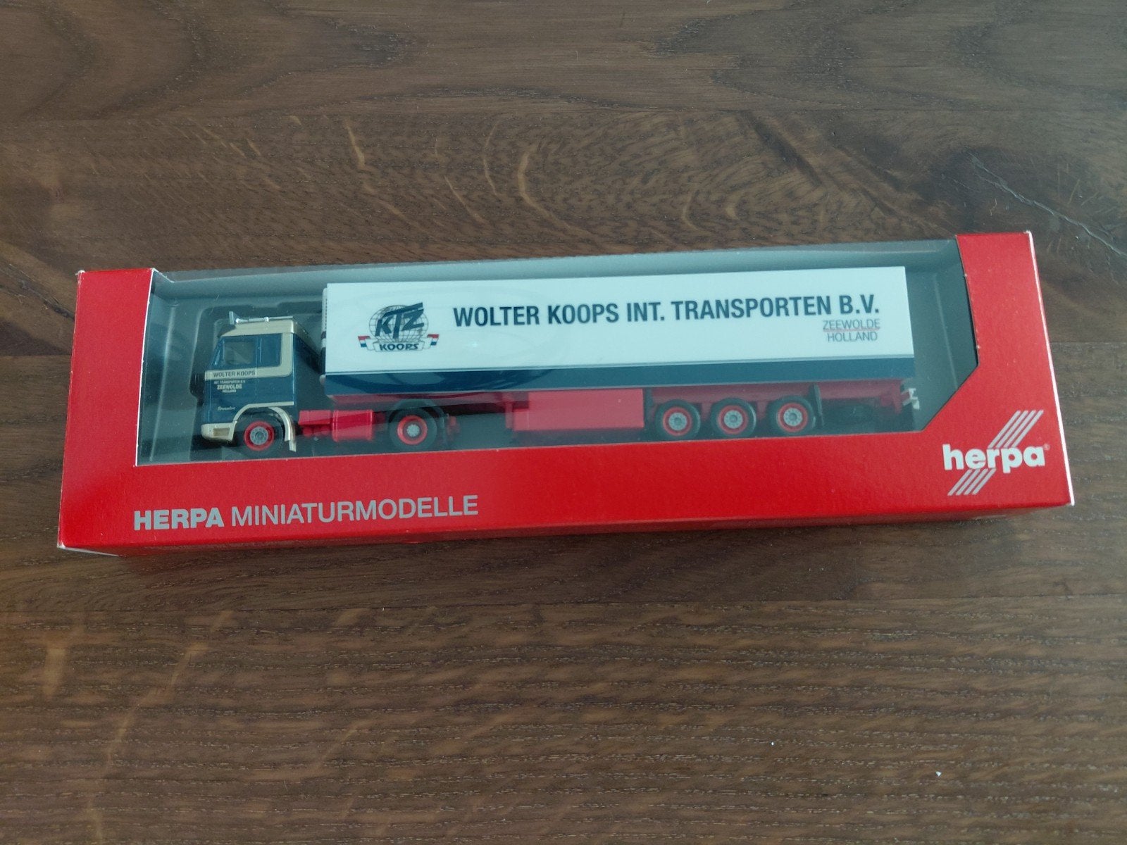 Scania 143 SL Wolter Koops 1:87 Herpa, Hobby en Vrije tijd, Modelauto's | 1:87, Ophalen of Verzenden, Zo goed als nieuw, Bus of Vrachtwagen