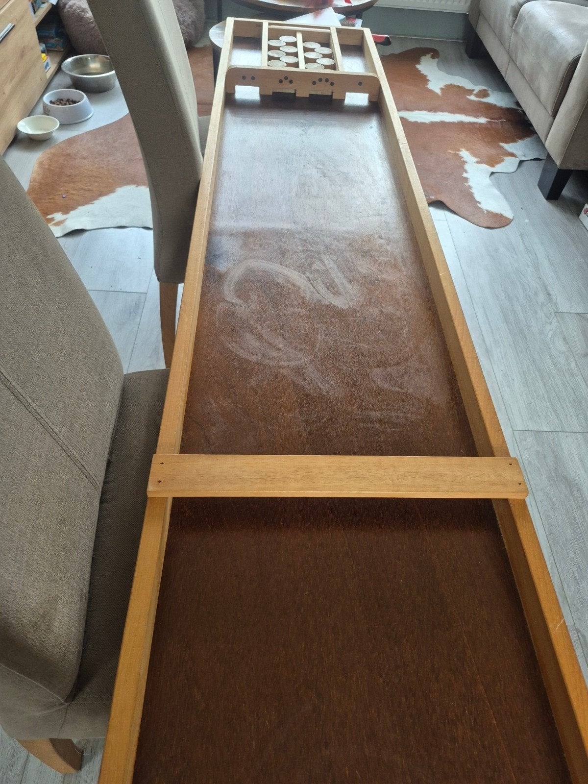 sjoelbak 2 meter, Ophalen