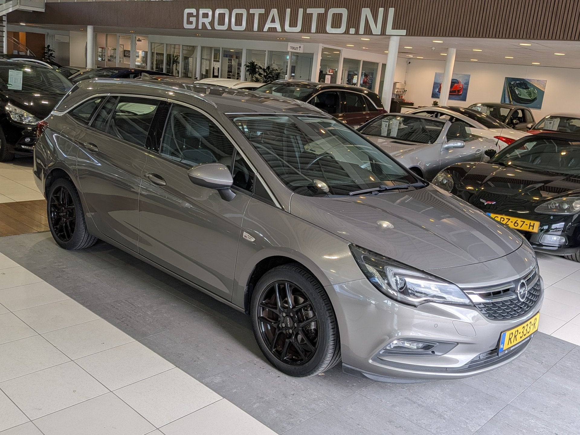 Opel Astra Sports Tourer 1.4 Innovation Automaat Airco, Crui, Gebruikt, 4 cilinders, 150 pk, Leder en Stof