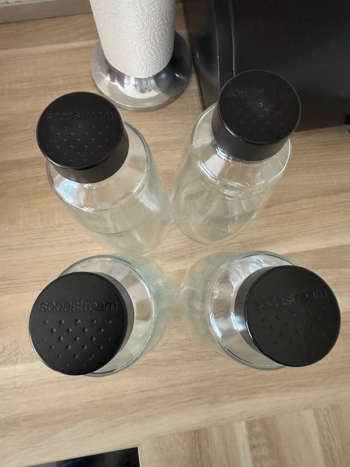 4 SodaStream glazen flessen met zwarte doppen, Ophalen, Gebruikt