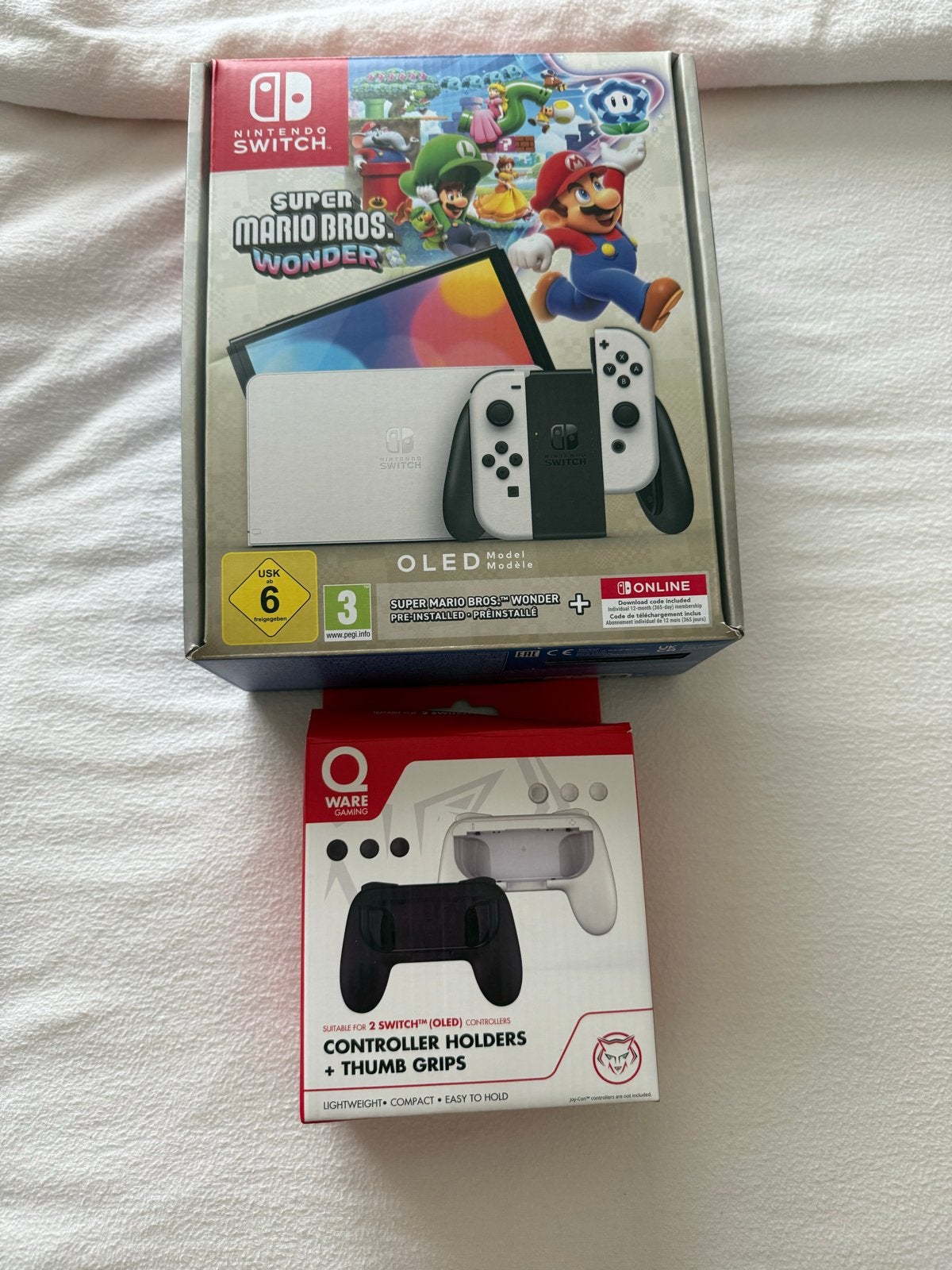 Nintendo Switch OLED + controller en 5 games