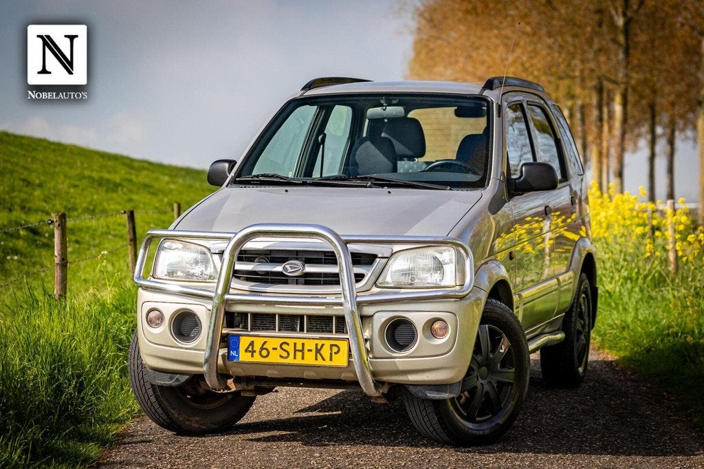 Daihatsu Terios 1.3 SXE |Automaat |Nap |Airco |Trekhaak, Auto's, Daihatsu, 1350 kg, Metallic lak, 4 cilinders, Met garantie (alle)