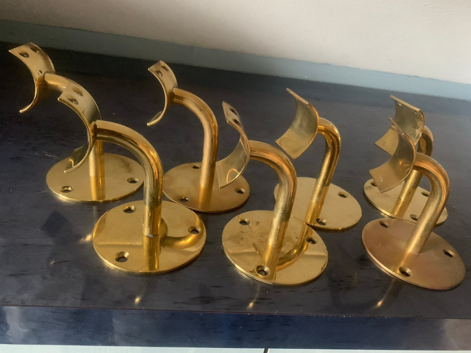 Set van 7 messing leuninghouders, Vintage, Gebruikt, Ophalen of Verzenden, Goud