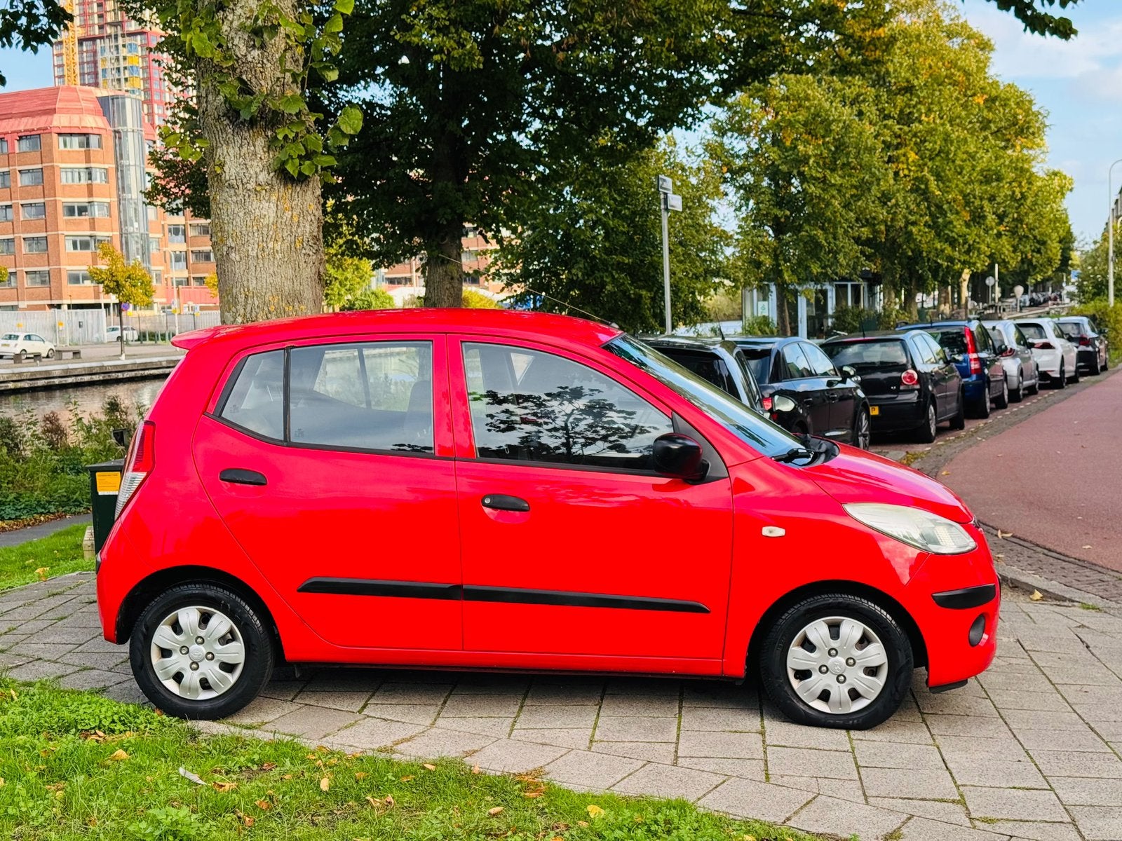 Foto 10 van Hyundai i10 1.1 I 5DR 2008 Rood