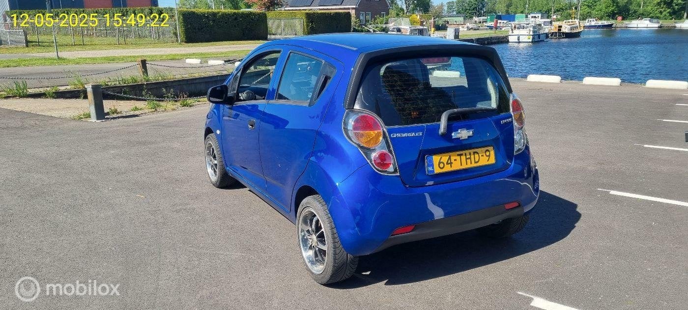 Chevrolet Spark1.0 Bi-Fuel lm wielen el ramen airco nwe apk, Auto's, Euro 5, 4 cilinders, Blauw, Origineel Nederlands