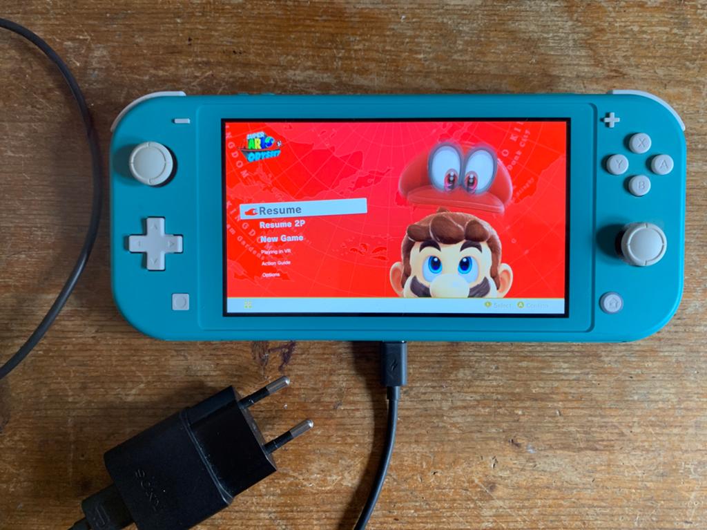 Nintendo Switch Lite met Mario Odyssee en Animal Crossing, Spelcomputers en Games, Spelcomputers | Nintendo Switch Lite, Ophalen of Verzenden