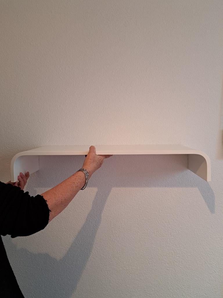 Wandplank van trendhopper, Ophalen
