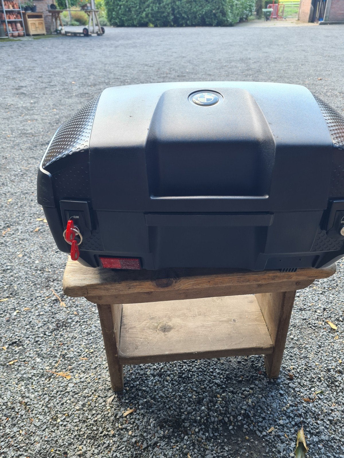 bmw topkoffer, Ophalen