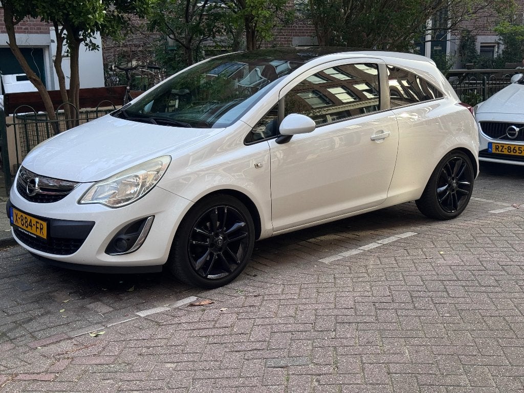 Opel Corsa 1.4 64KW 3D 2011 Wit, Auto's, Opel, Voorwielaandrijving, Stof, 40 €/maand, 4 cilinders