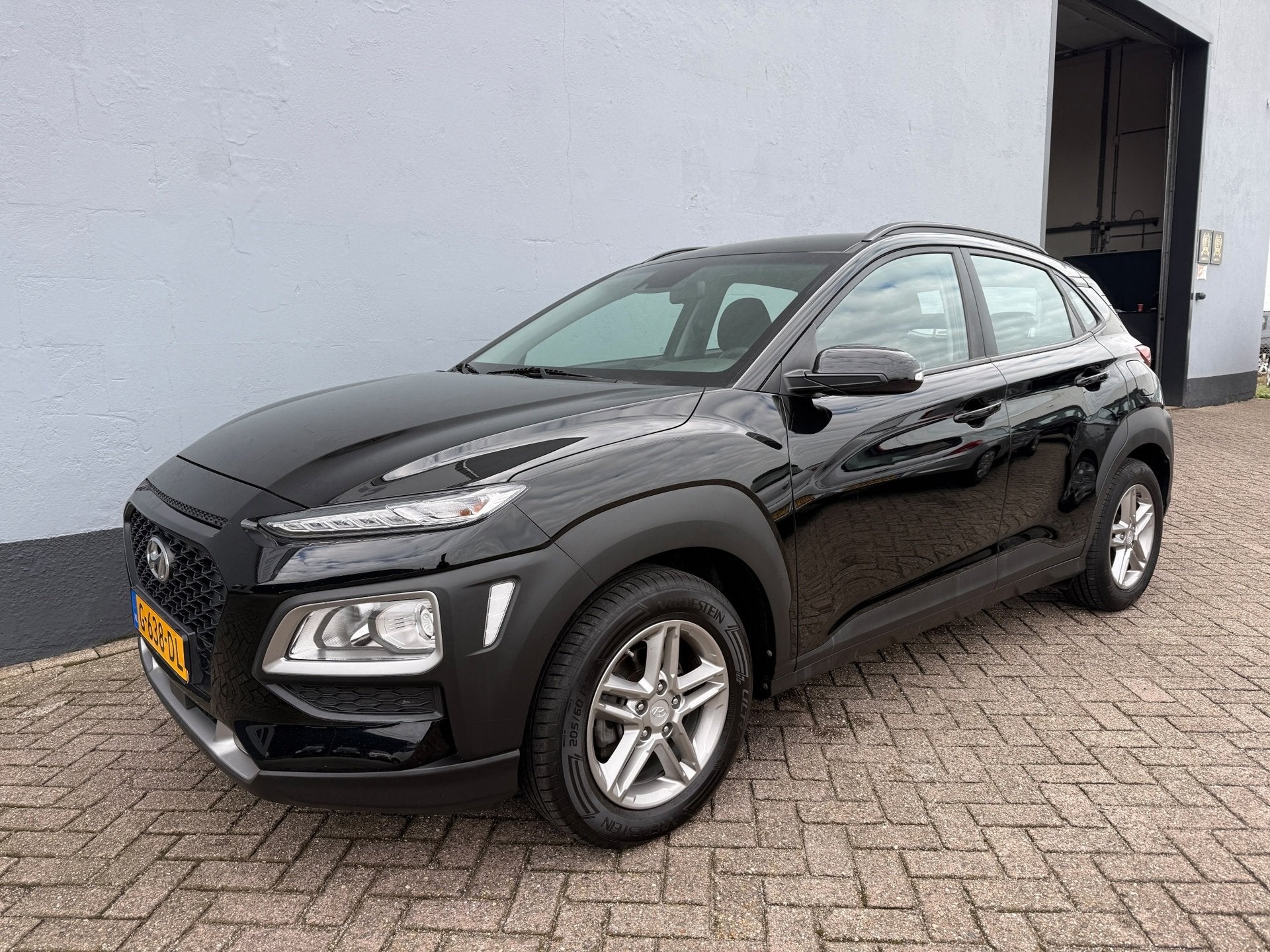 Hyundai Kona 1.0 T-GDI Comfort - Carplay, Auto's, Voorwielaandrijving, Gebruikt, Euro 6, Zwart