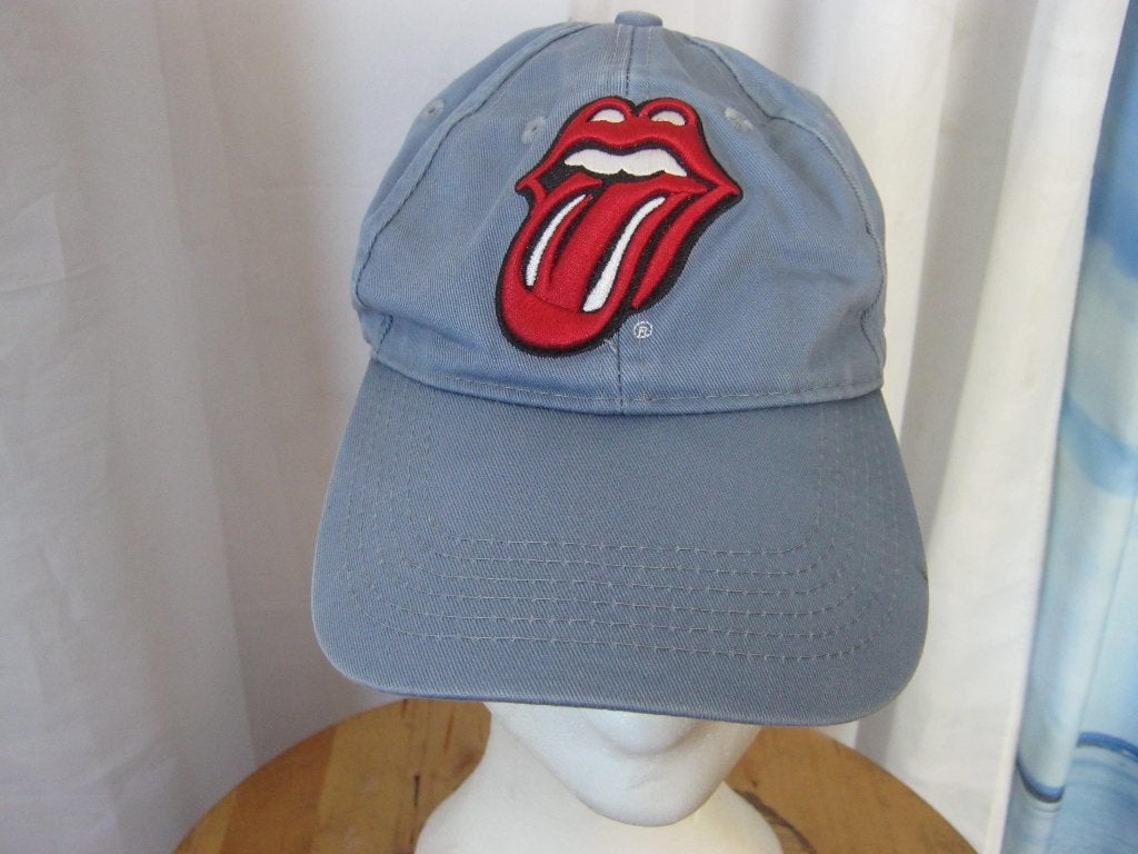blauwe pet met vlekje en donkerder plek the rolling stones, Ophalen of Verzenden, Zo goed als nieuw