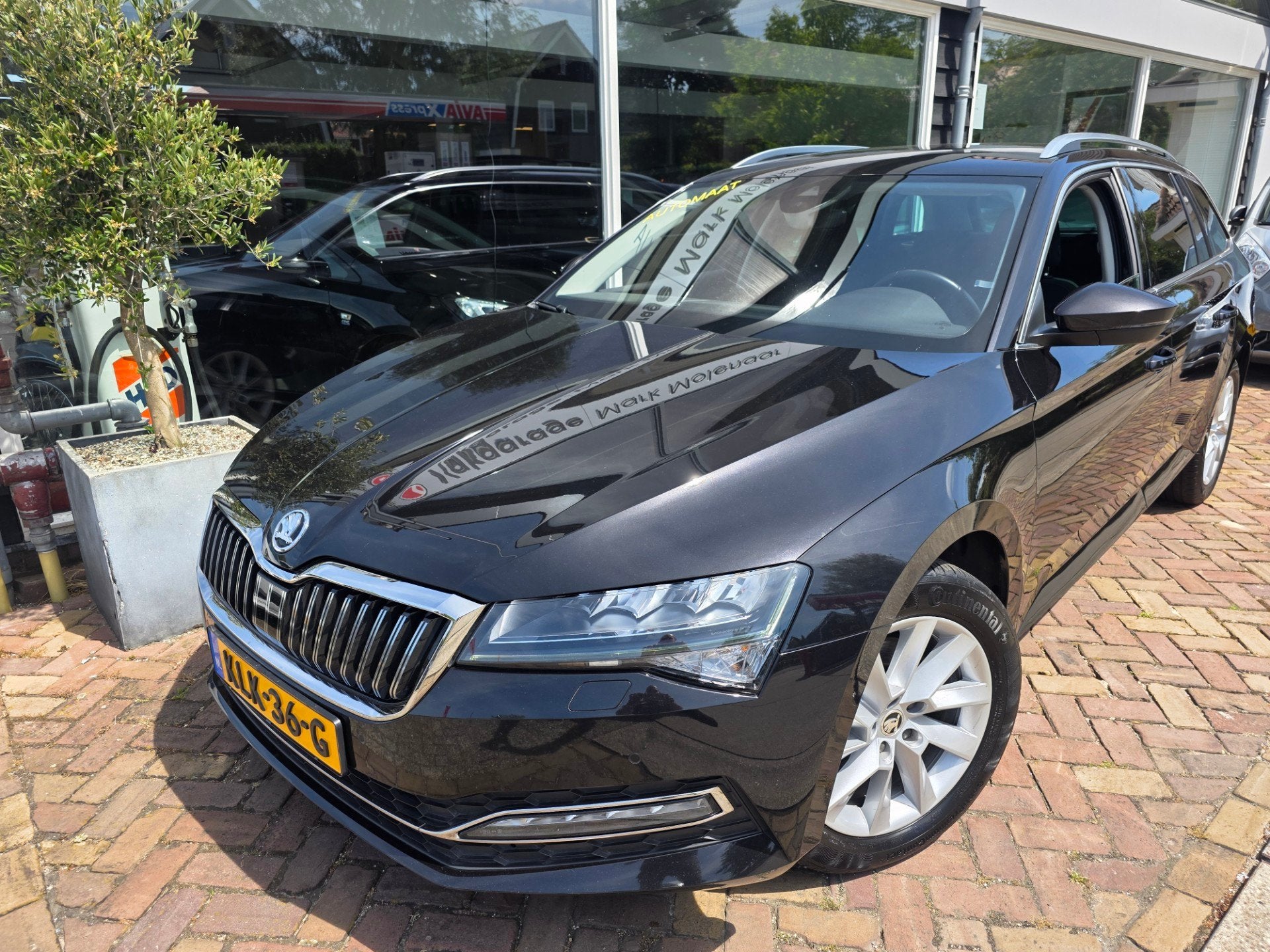 Skoda Superb Combi 1.5 TSI ACT Business Edition Plus,trekhaa, Auto's, Euro 6, 4 cilinders, 150 pk, Zwart